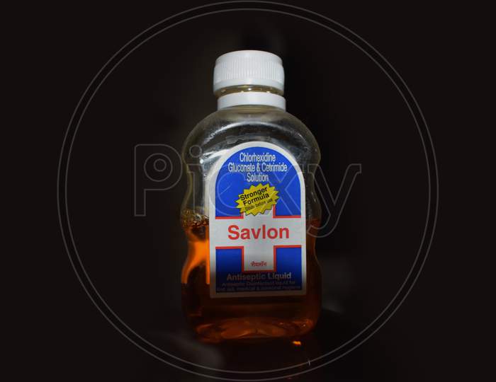 Savlon antiseptic liquid bottle.