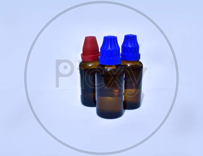 Homeopathy medicine bottles with isolated background.