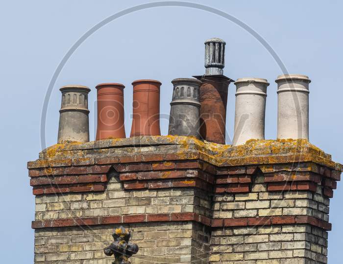 Chimney Pots Stacks Against Blue Sky