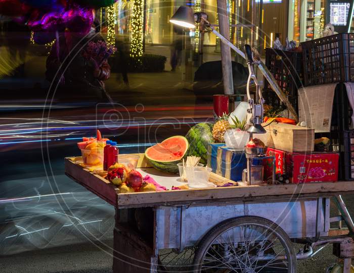 Fruit Stall On A Bicycle Cart In Sanlitun, Chaoyang District In Beijing, China
