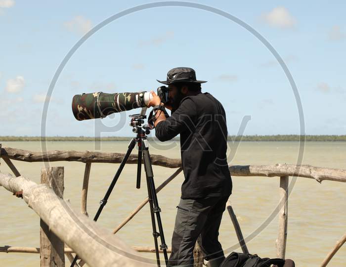 Travel Photographer in the work