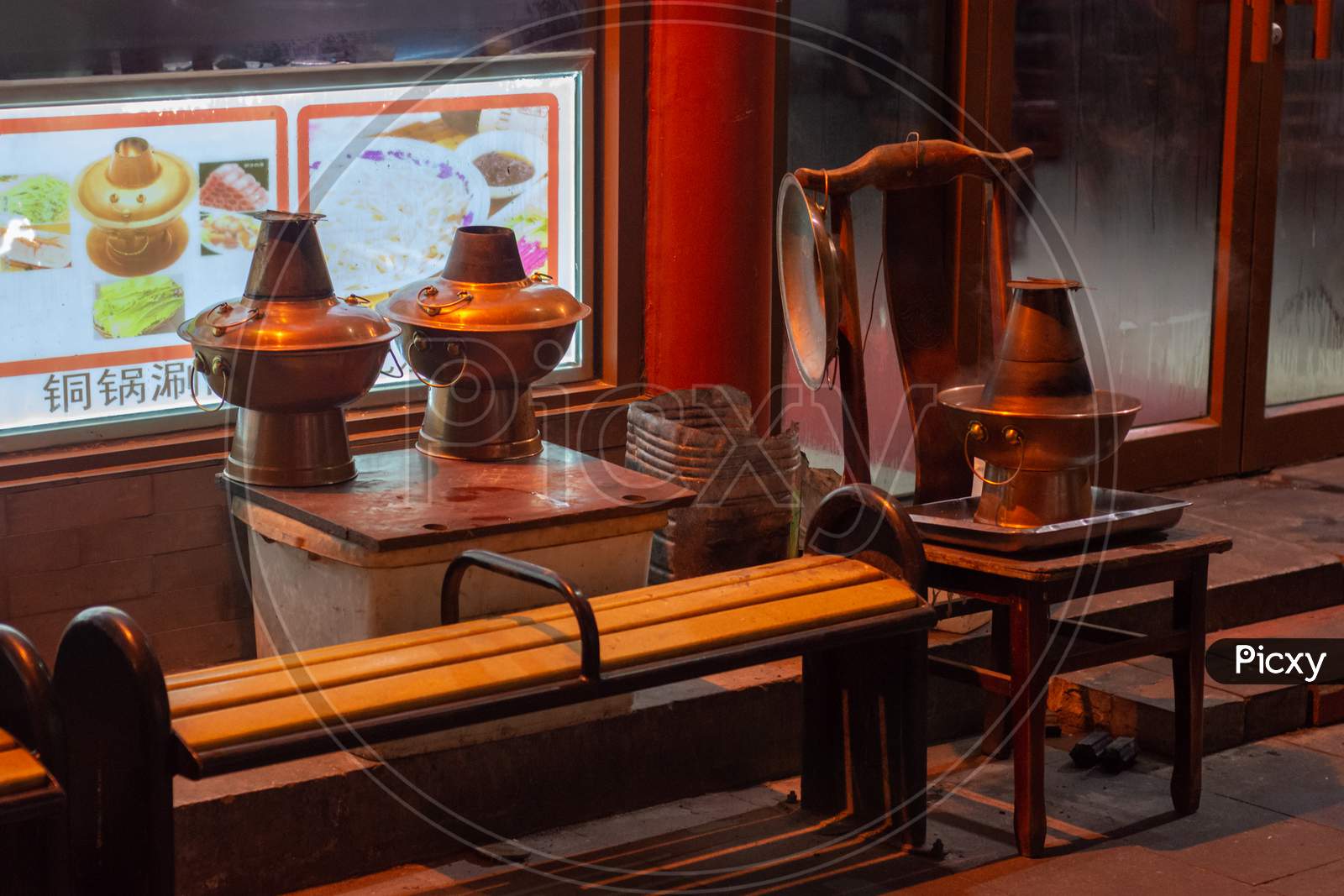 Hot Pots Cooling Off In Front Of The Restaurant In Old Qianmen Street In Beijing