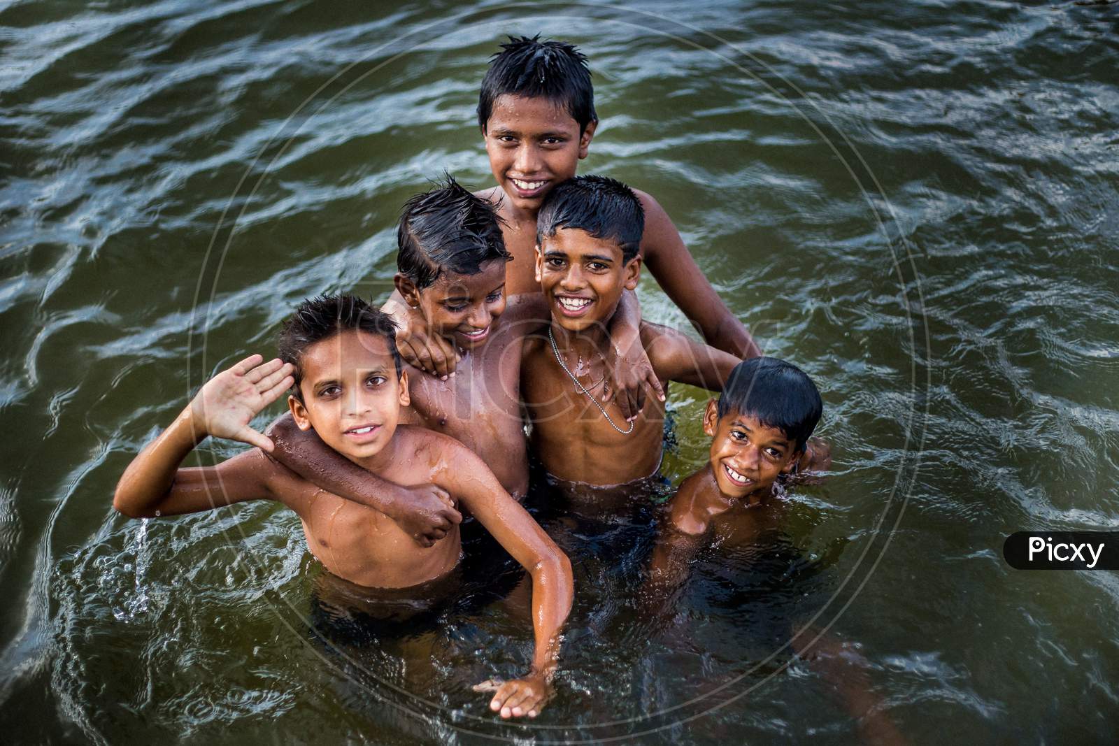 Carefree Playful kids in river kaveri.