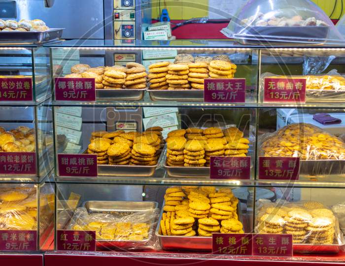 Traditional Pastry And Cookies On A Street Market Food Stall In Luoyang, China