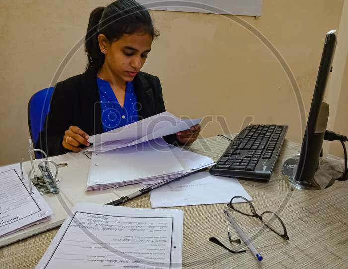 Image Of Indian Office Girl Working Technically YJ801793 Picxy   16291837df4df0fbde951ecca0353789 