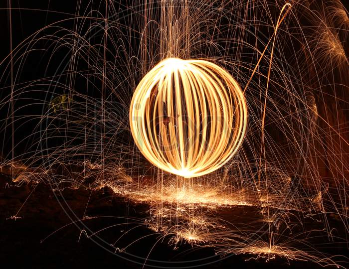 Spinning Fireworks Light Making Attractive Design In The Night