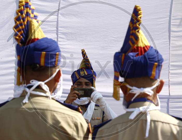 Policemen click photos after taking part in India's 74th Independence Day celebrations In Chandigarh August 15, 2020