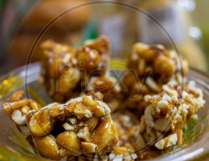 View Of Chikki, Which Is A Popular Indian Sweet Made From Ground Nut And Jaggery.
