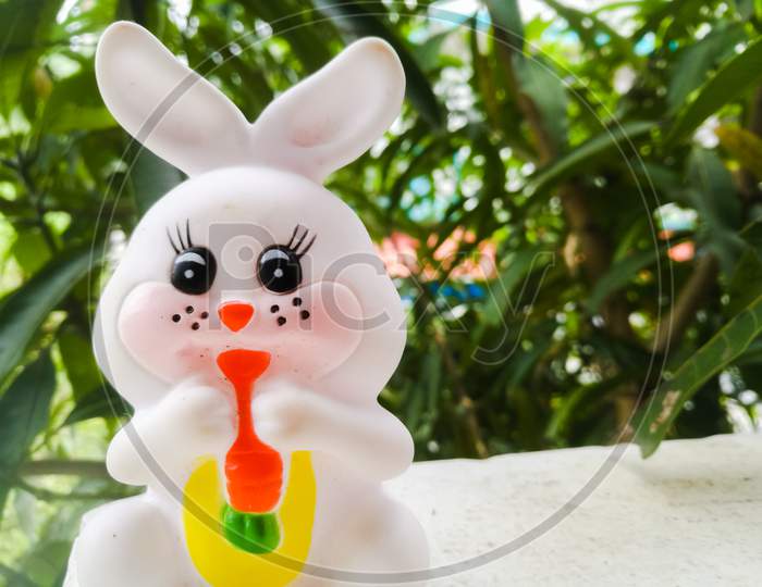 Toy Rabbit Of Small Size In White Color And Have Black Eyes.