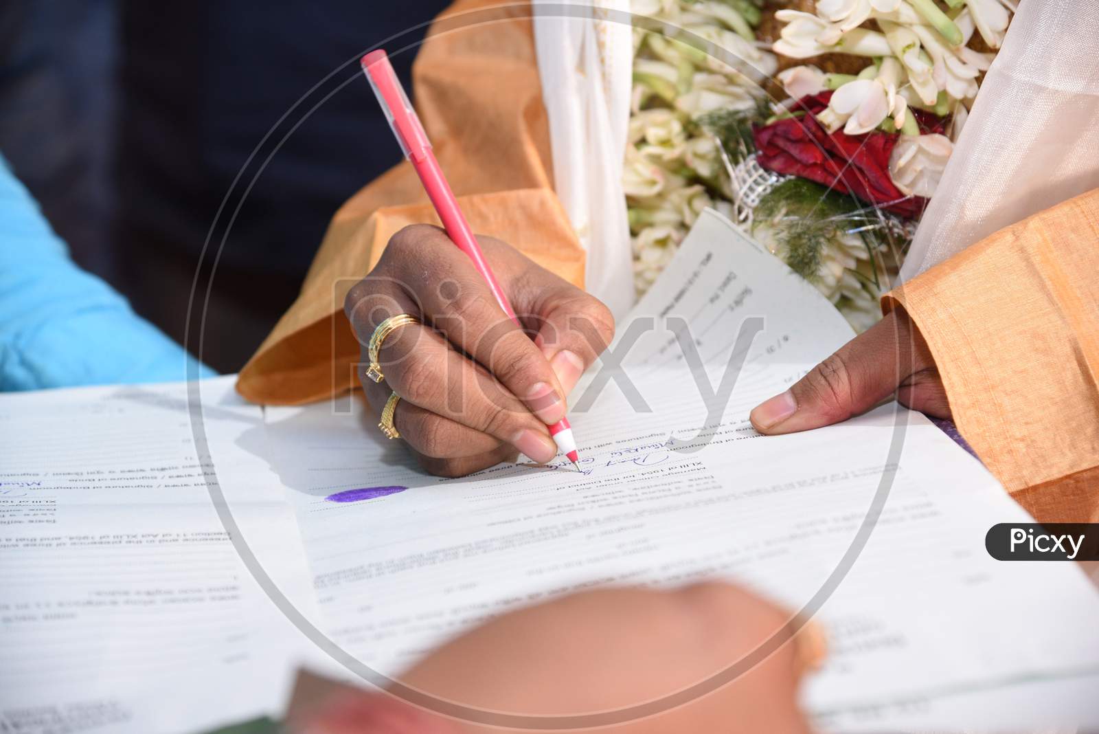 Groom Doing Signature On Marriage Register In India,