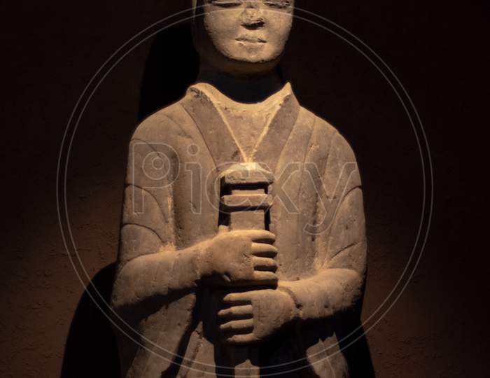 Ancient Stone Statue Of A Warrior In Luoyang Museum In Luoyang, China
