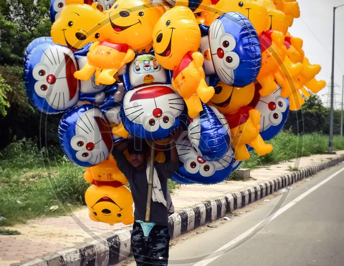 Man with ballons