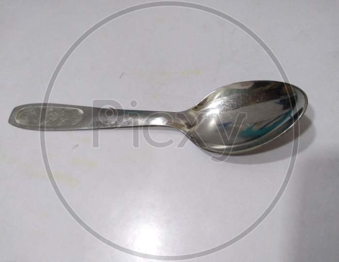 Spoon in dinner table