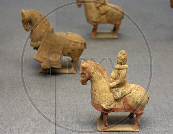 Ancient Stone Figurines Of Horsemen In Luoyang Museum In Luoyang, China