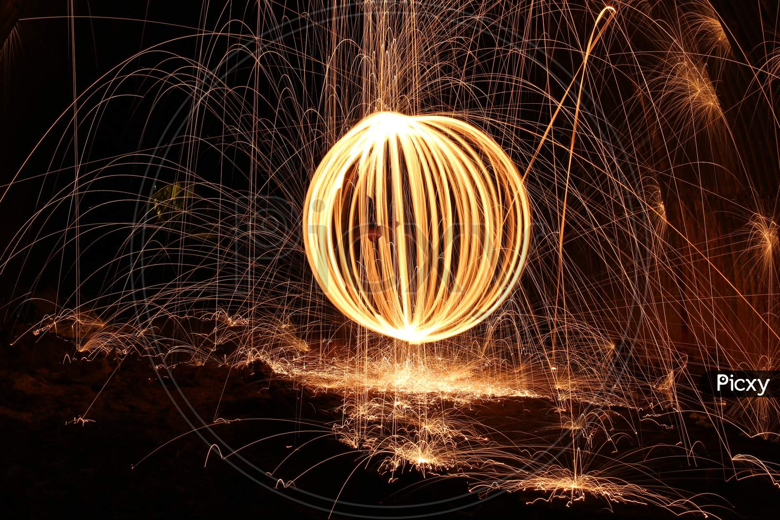 Spinning Fireworks Light Making Attractive Design In The Night