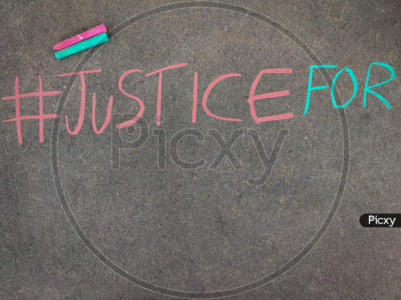 The Inscription Text On The Grey Board, #Justice For. Using Color Chalk Pieces. Copy Space