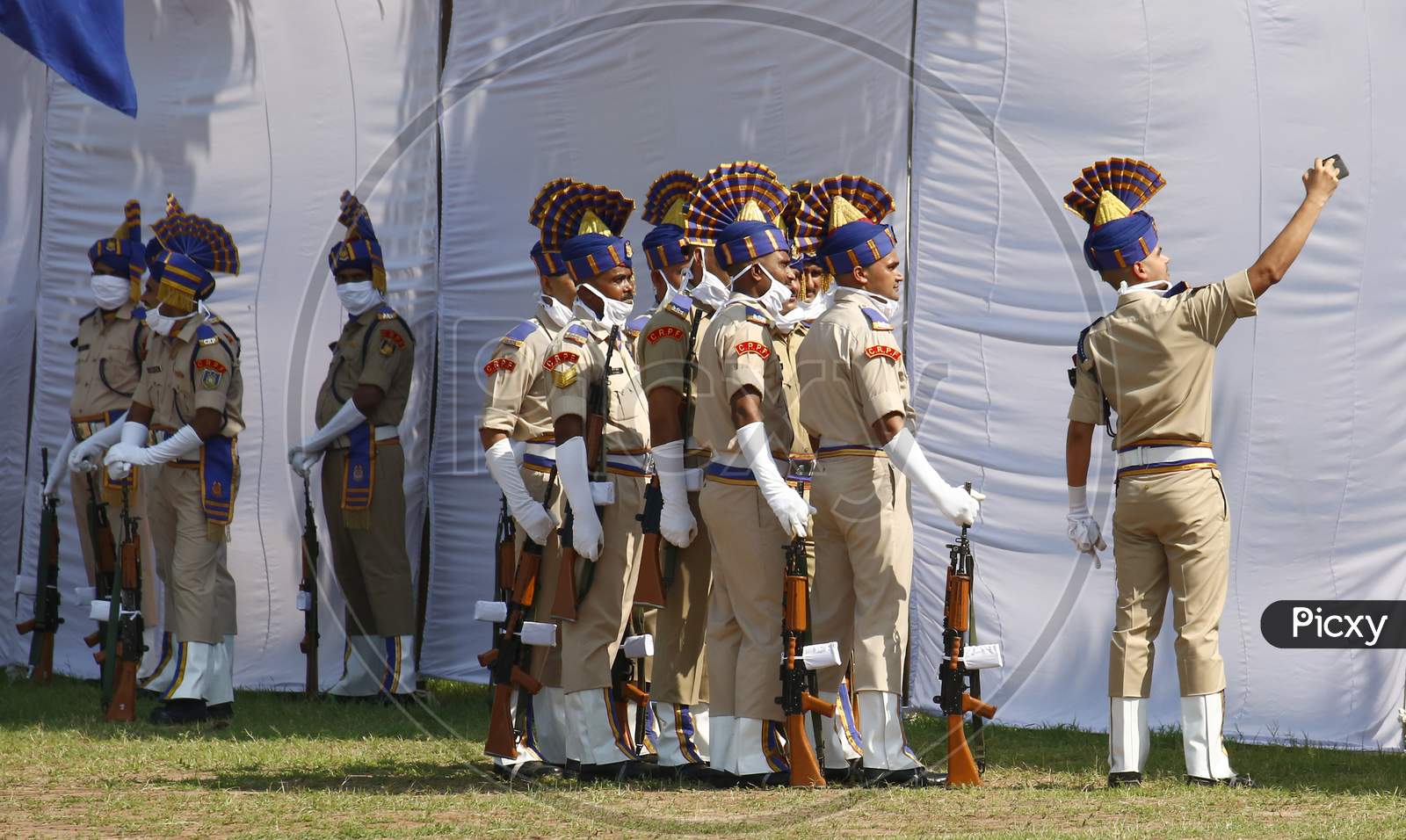 Policemen click a selfie after taking part in India's 74th Independence Day celebrations In Chandigarh August 15, 2020