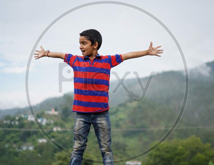 Portrait Of A Indian Pahadi Kid Who Belongs To The Mountains. Happy And Freedom
