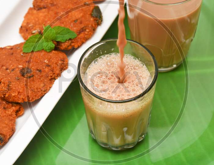 Parippu vada Kerala snack with Indian milk tea