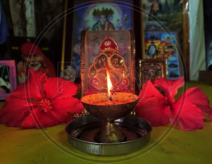 Ganesh idol with lamp, ganpati sthapana at home in lockdown