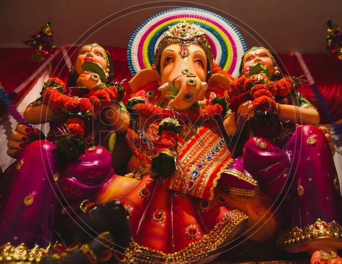 Colorful idol of lord ganesh in a temple
