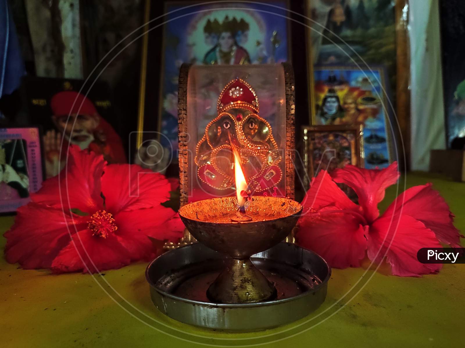 Ganesh idol with lamp, ganpati sthapana at home in lockdown