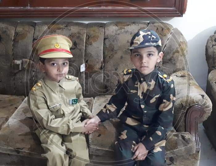Child in Military uniform*