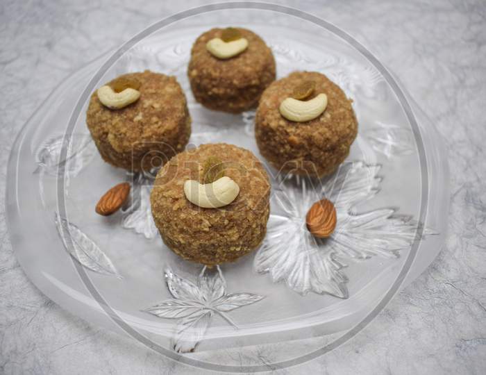 Offering For God Prashad Ladoo Garnished With Fry Fruits For Ganesh Chaturthi Festival In India. Wish Happy Ganesh Chaturti With Sweet Dish Tasty Laddus