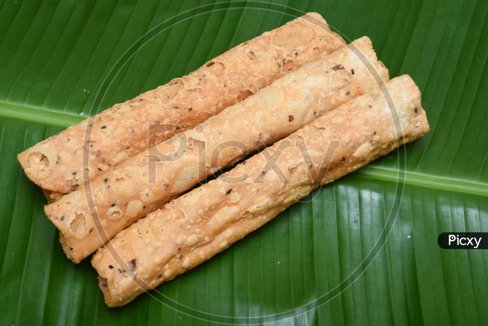 Kerala fried snack Kuzhalappam for Onam, Vishu