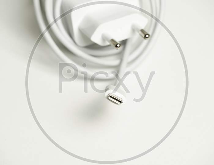 Smartphone Charger With Usb Type C On A White Background. Technology Concept