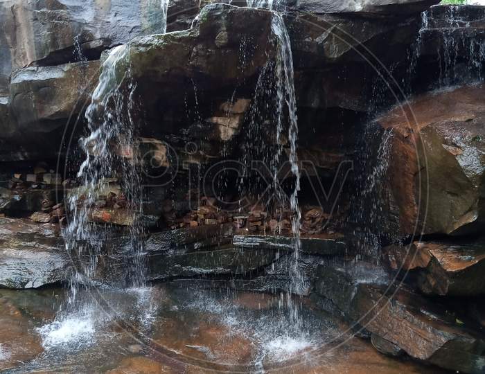 Water Flowing From Big Rocks