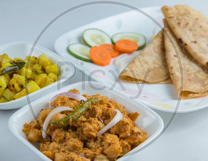 Spicy Indian vegetarian breakfast meal - Indian naan bread - Chapati bread