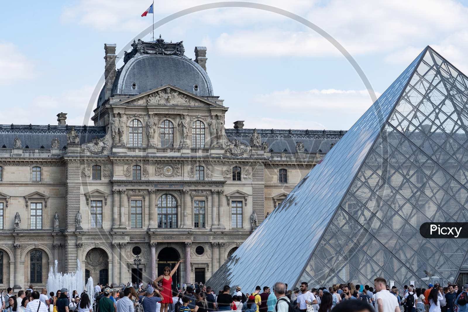 Louvre Museum Paris With Visitors At Bright Sunny Day. Paris - France, 31. May 2019
