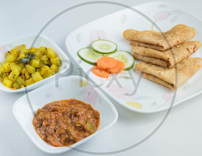 Spicy Indian vegetarian breakfast meal - Indian naan bread - Chapati bread