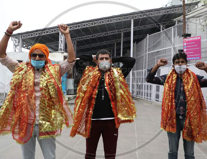 Devotees shout religious slogans after darshan at Mata Vaishno Devi bhavan atop Trikuta Hills in Reasi district of Jammu and Kashmir to pay obeisance at Katra in Reasi district, on August 16 2020,