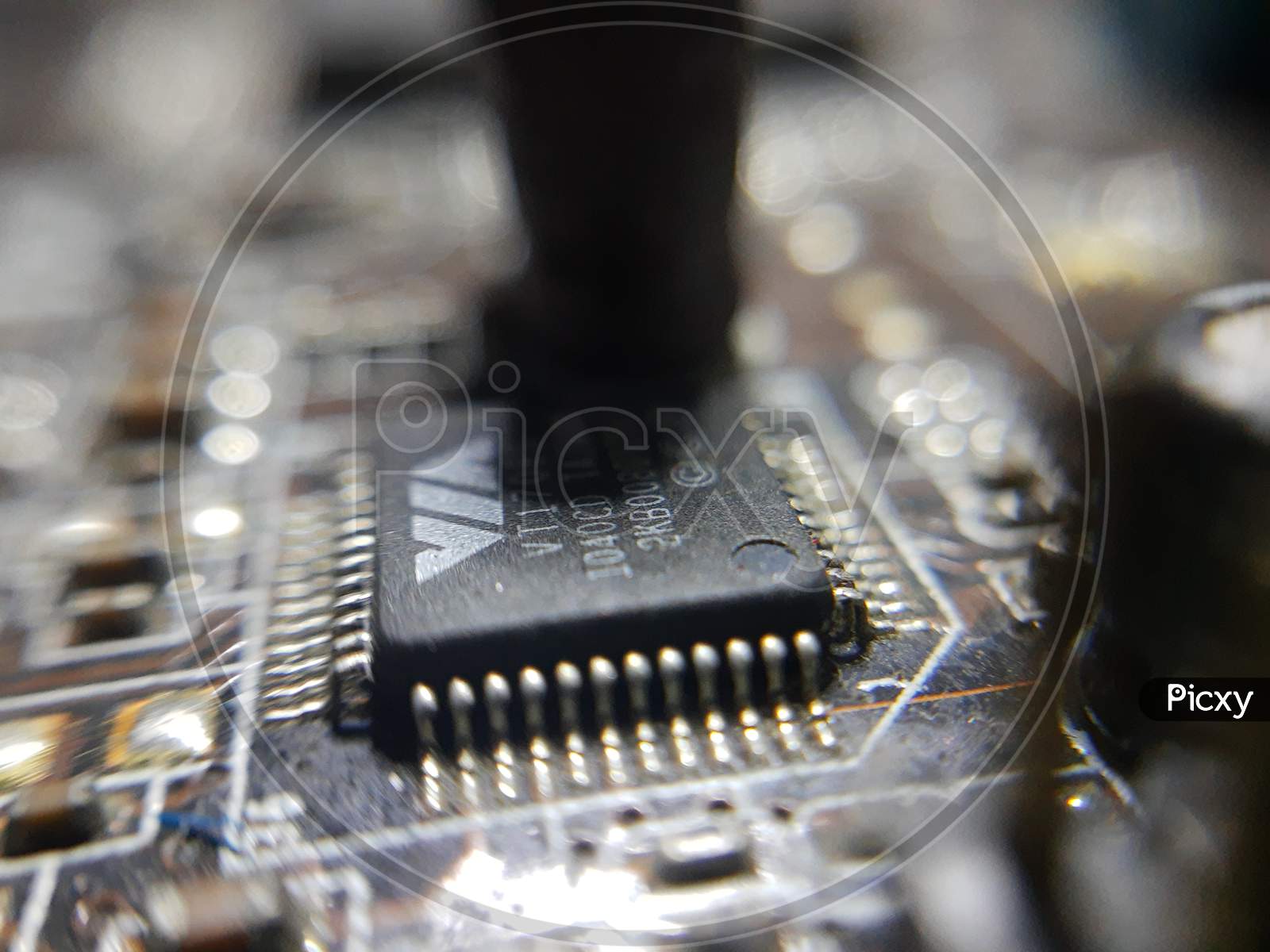 Computer Hardware. Motherboard, A Close-Up Microchip With Many Electrical Components Placed On The Board