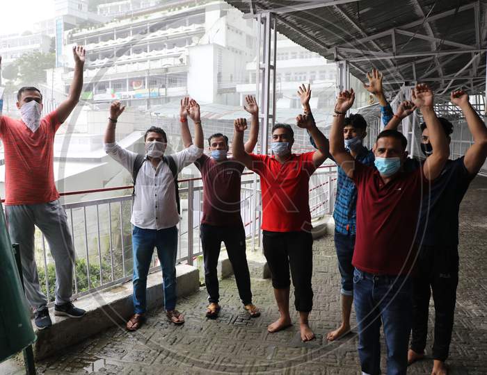 Devotees shout religious slogans after darshan at Mata Vaishno Devi bhavan atop Trikuta Hills in Reasi district of Jammu and Kashmir to pay obeisance at Katra in Reasi district, on August 16 2020,