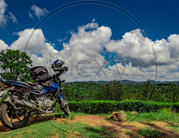 Motorcycle Parked At Remote Trails Of Tea Garden