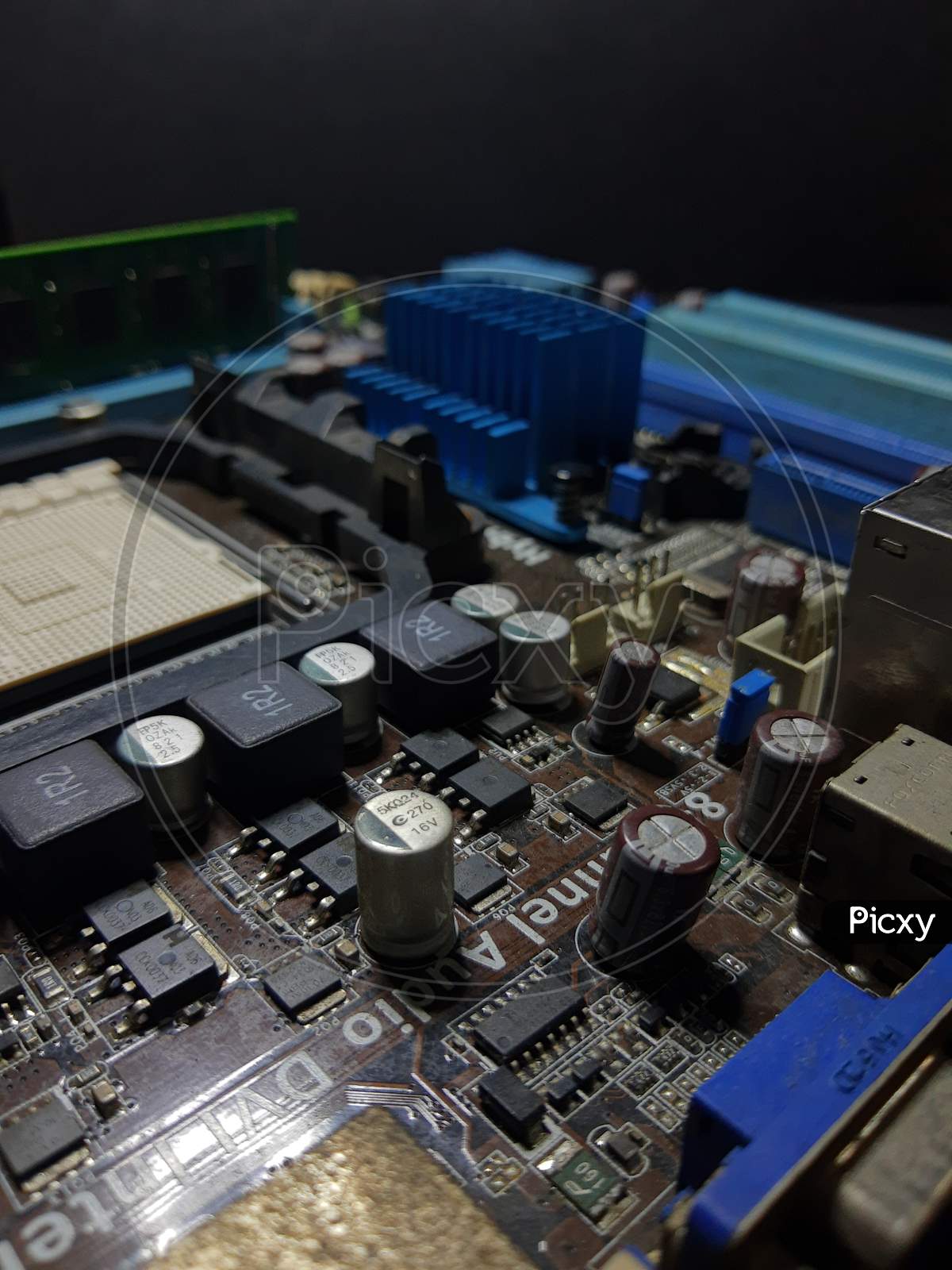 Computer Hardware. Motherboard, A Close-Up Microchip With Many Electrical Components Placed On The Board
