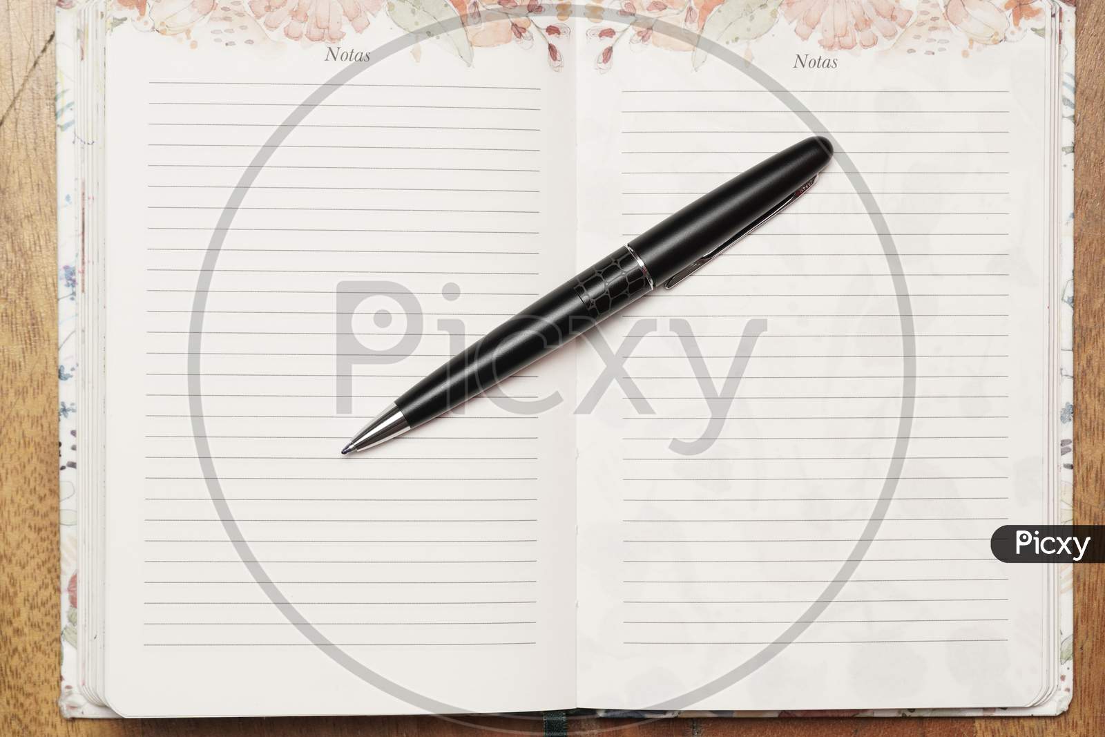 Flat Lay Of Black Pen On Open Agenda. Organization Concept.