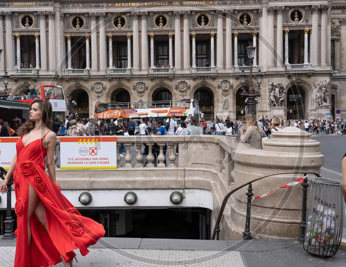 Academy National Of Music With Photo Shooting Of Red Dress In Foreground. Focus On Background. Paris - France, 31. May 2019