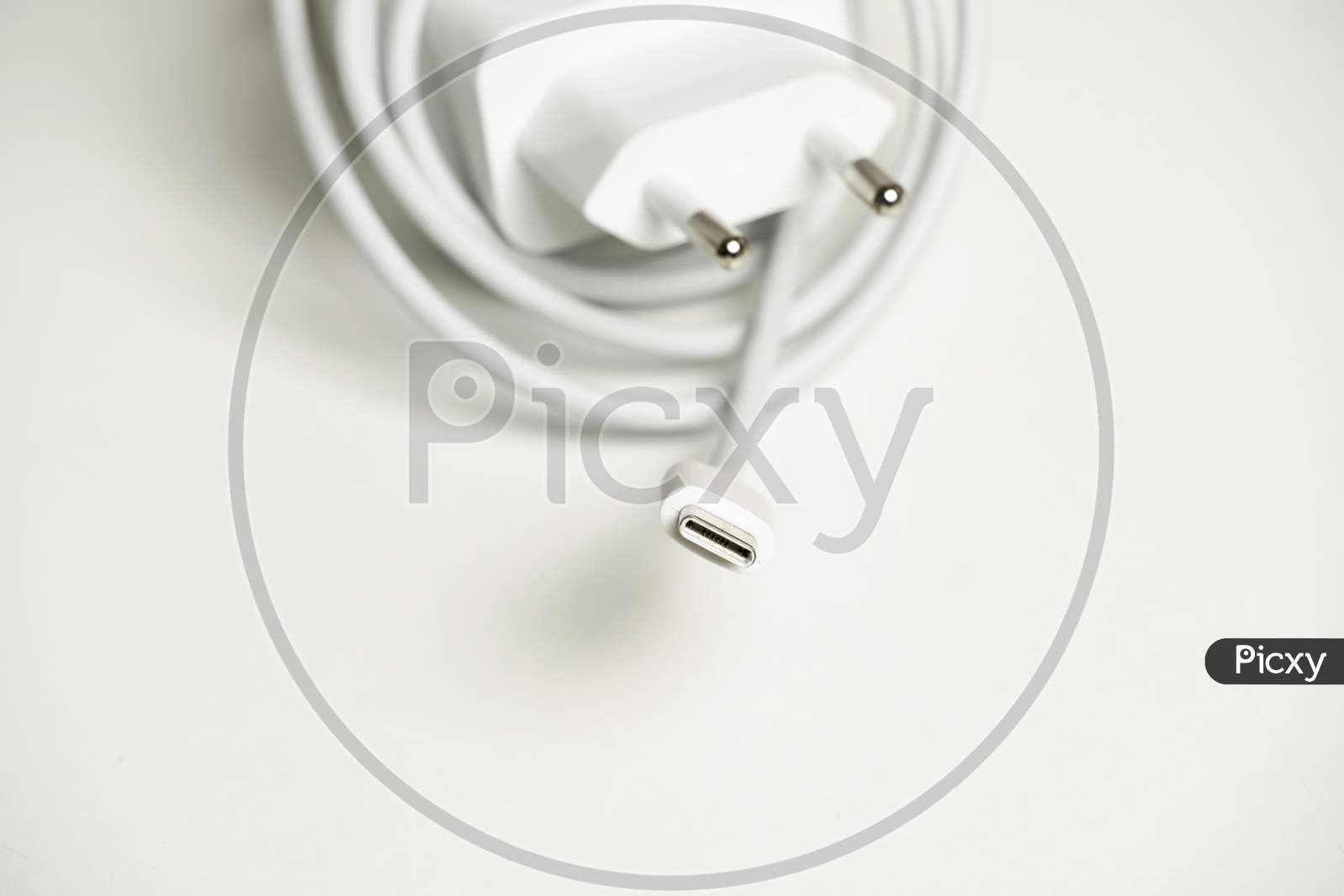 Smartphone Charger With Usb Type C On A White Background. Technology Concept
