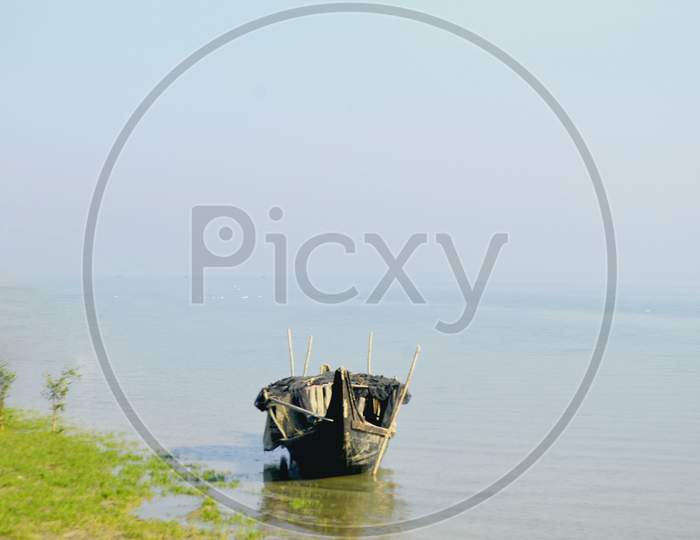 Small Fishing Boat On The Sea In A Summer Day