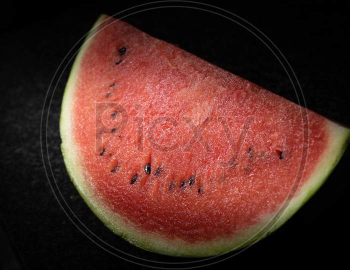 Watermelon lit to see red colors and texture