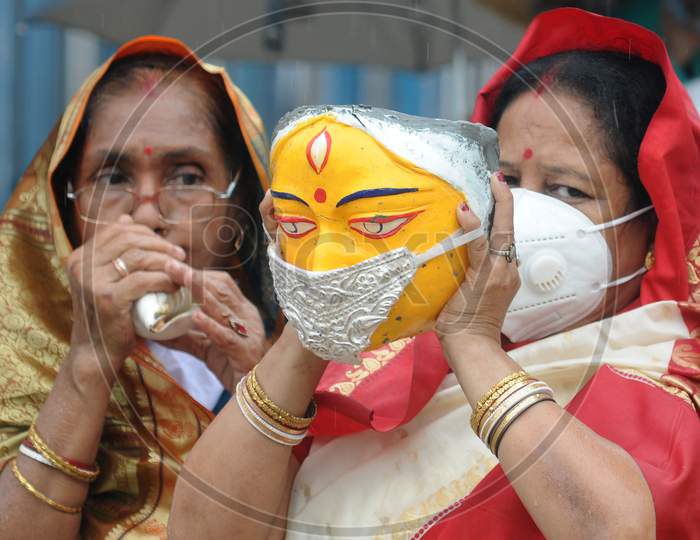 A Puja Commitee decorates Silver Fasce Mask use an idol of goddess Durga being Durga Puja festival, in Kolkata