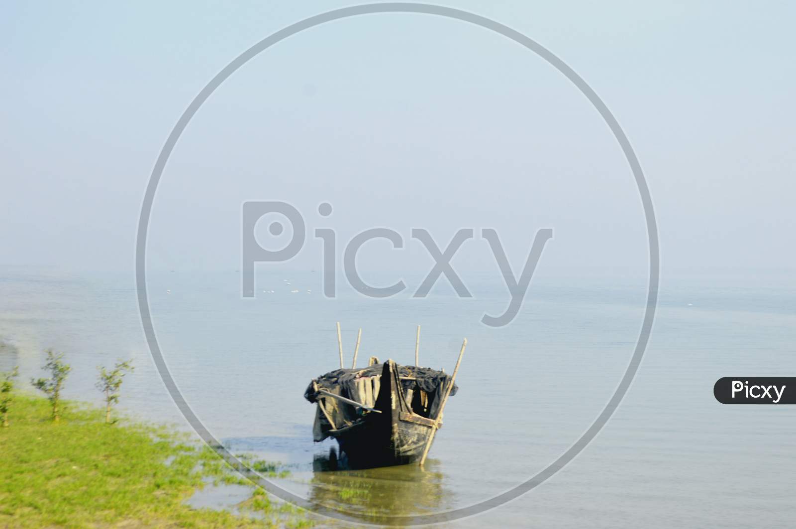 Small Fishing Boat On The Sea In A Summer Day