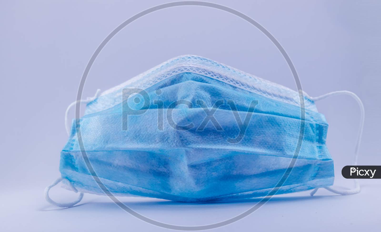 Surgical mask for protection against the pandemic. Covid-19 protective measures.