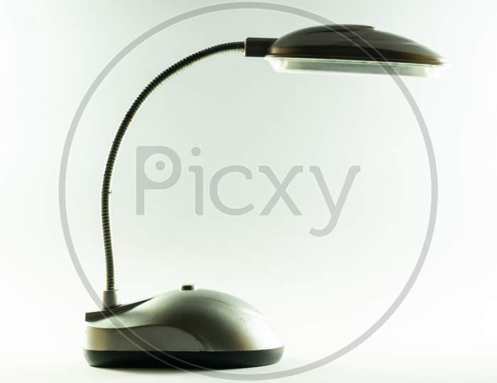 Table lamp like in computer mouse shape in white background