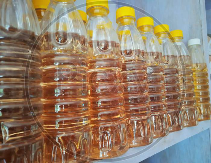 Petroleum Residue Tarpeen Oil Bottles Arranged In Shop