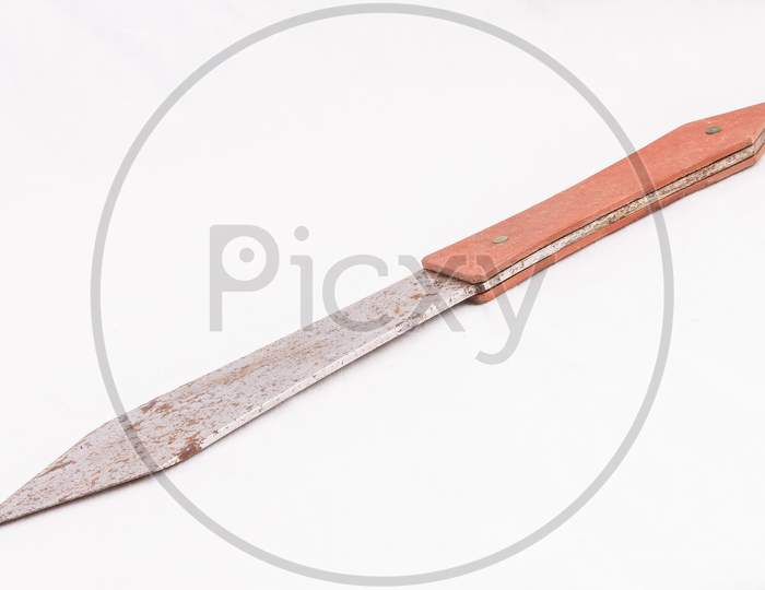 Vintage Rusty Throwing Knife On White background